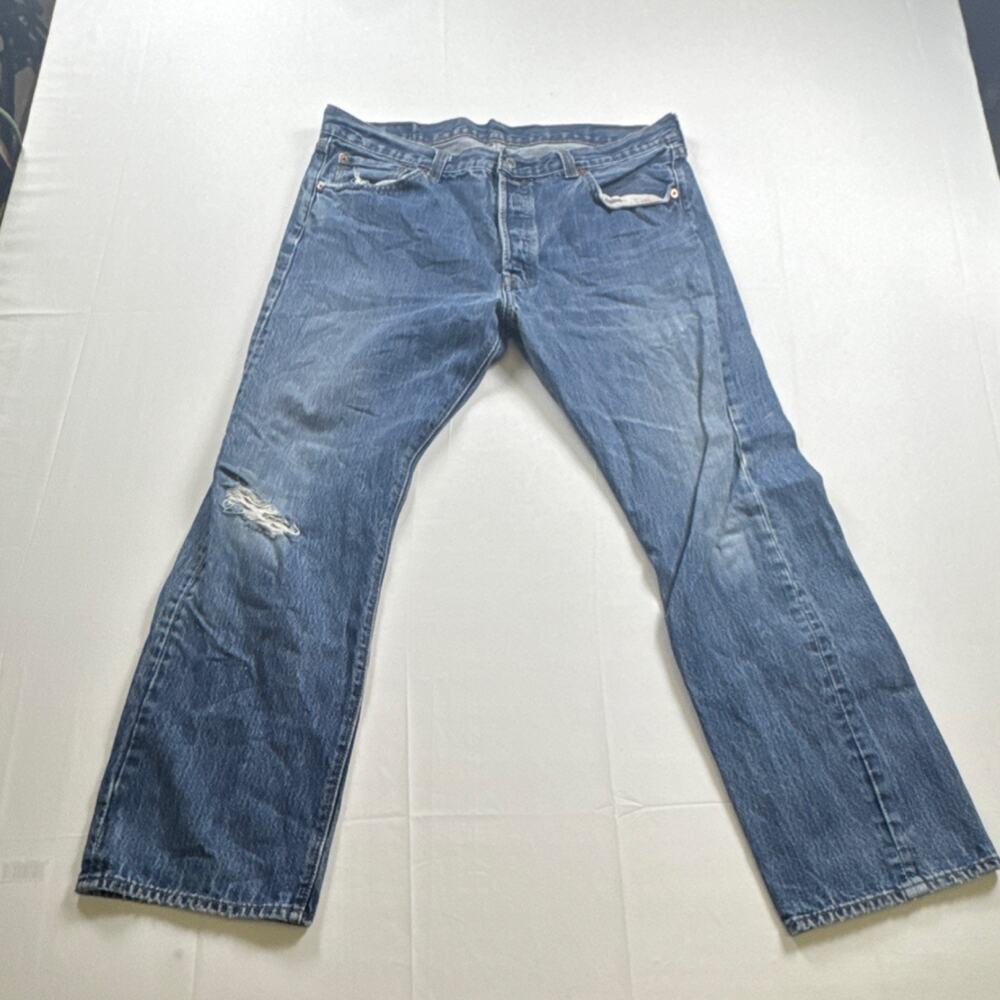 Vintage y2k 501 Straight Fit Jeans 90s Dark wash with some distressing.